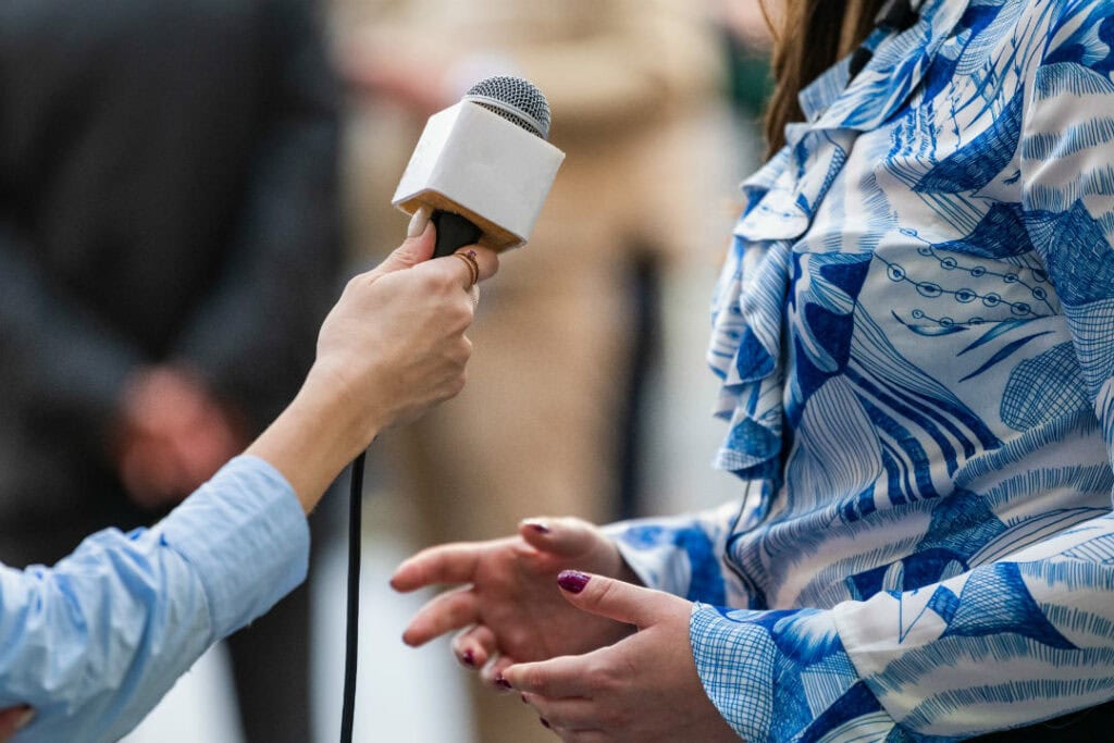 A woman being interviewed