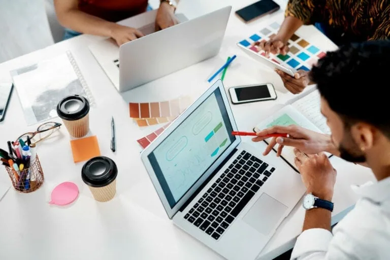 Closeup of graphic designers working