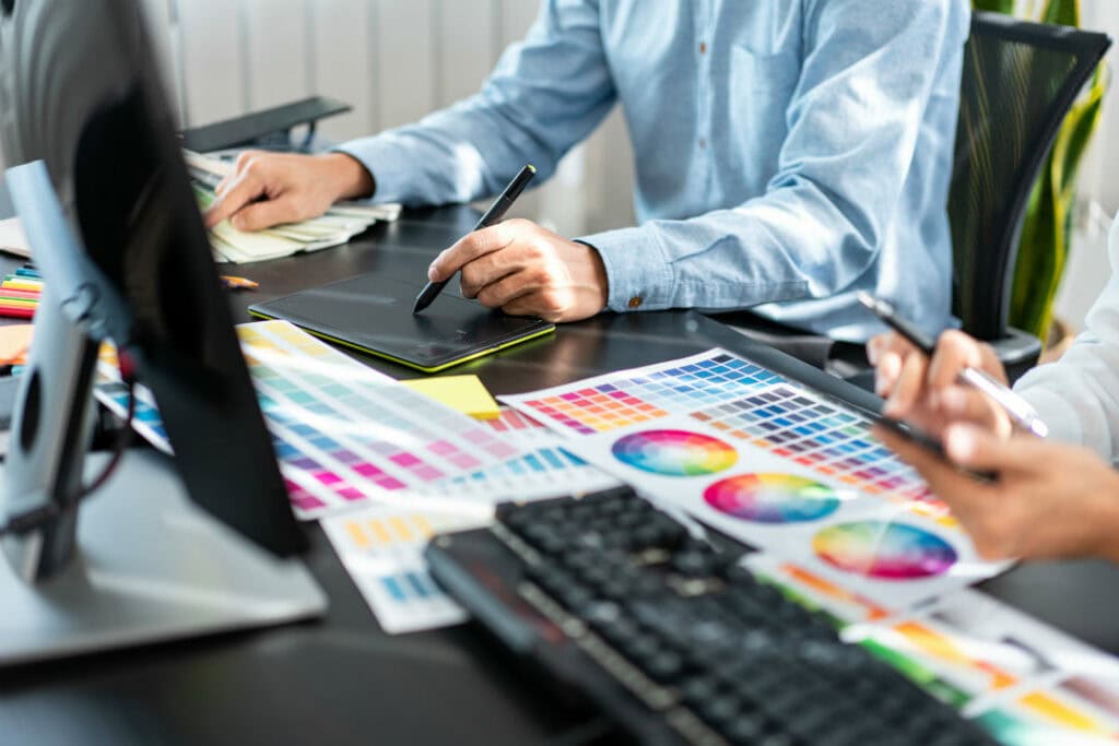 Closeup of graphic designers working
